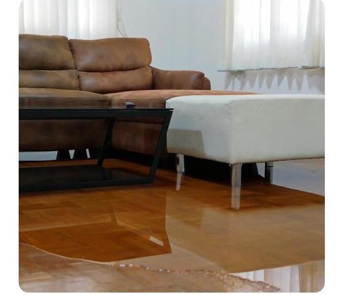 Furniture on a water covered floor.