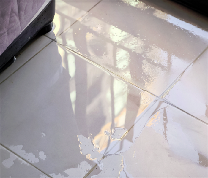 water covering tile floor